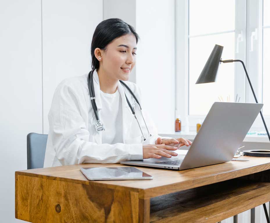 Doctor Using Computer